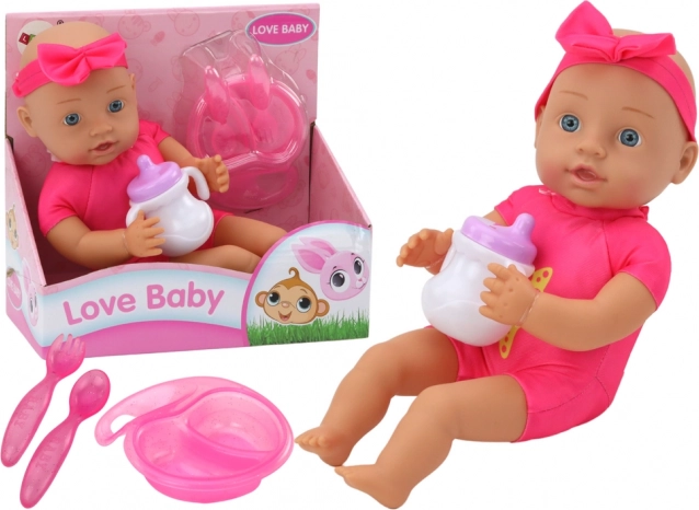 Stoffen babypop met roze haarband en voederset