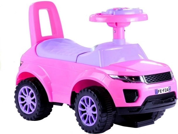 Roze kinderloopauto met geluiden en licht