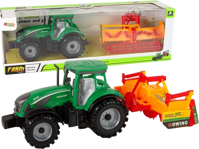 Groene tractor met oranje cultivator – set met vliegwiel voor kinderen