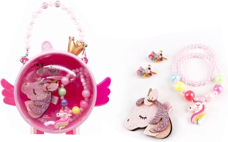 Kinderhandtas met sieraden en een eenhoorn