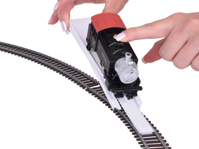 Elektrische treinstellen met klassieke stoomlocomotief en bedieningsunit