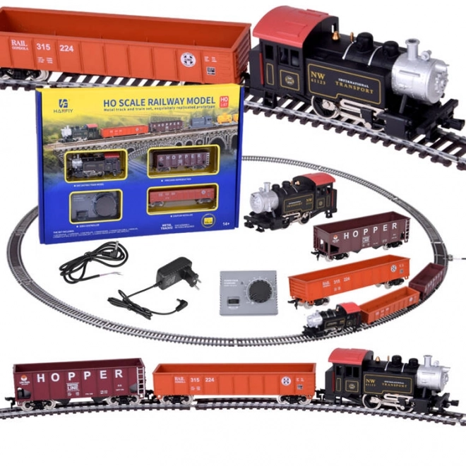 Elektrische treinstellen met klassieke stoomlocomotief en bedieningsunit
