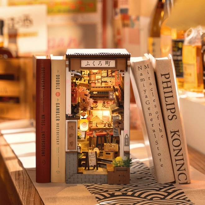 3D puzzel boekensteun Sakuralaan met wijn