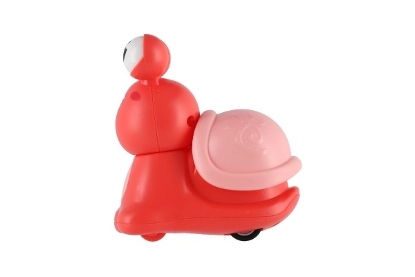 Slak Druk en Rijd plastic 8cm met opwindmechanisme 3 kleuren 12 stuks in doos