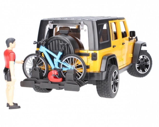 Bruder Jeep Wrangler Rubicon met fietser en fiets