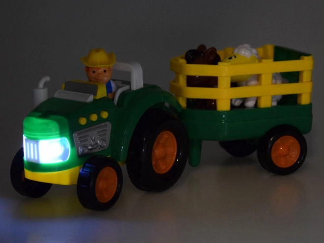 Boerentractor met aanhanger en dieren geluid + licht ZA5390