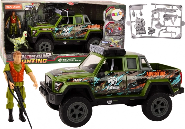 Groene terreinwagen met dinofiguren en geluidseffecten