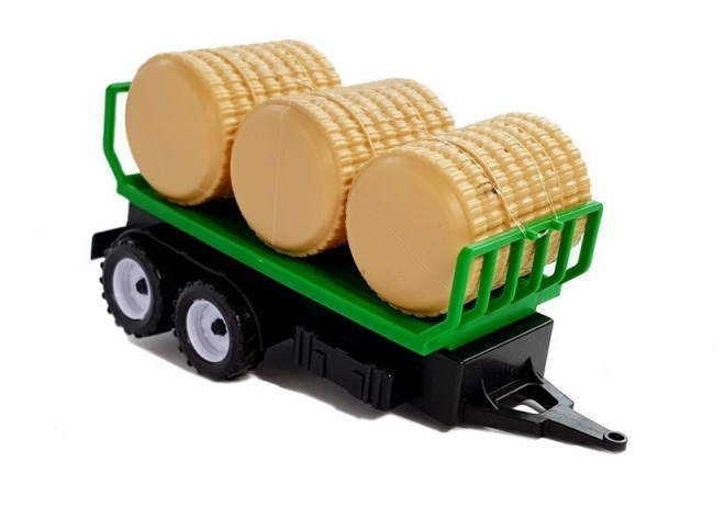 Tractor met aanhangwagen voor hooipakken Citerne