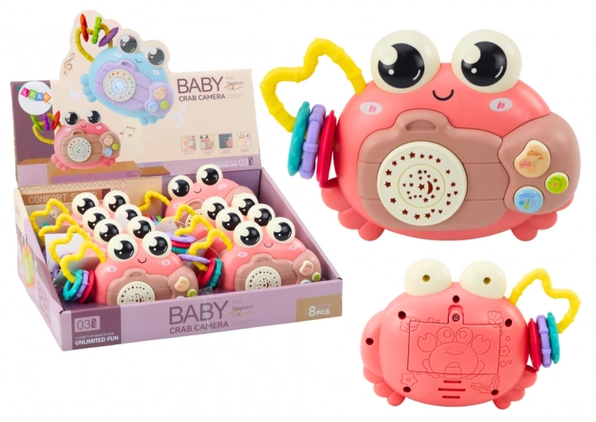 Roze interactieve krab met projector en rammelaar op batterijen