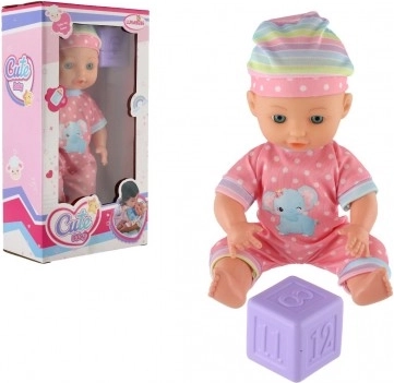 Baby pop 25 cm met stevig lichaam en dobbelsteen in doos