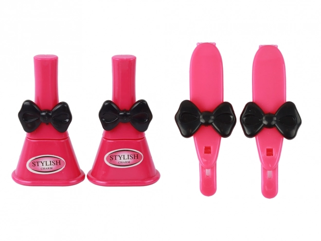 Stijlvol roze kinderkoffertje met cosmetica-accessoires