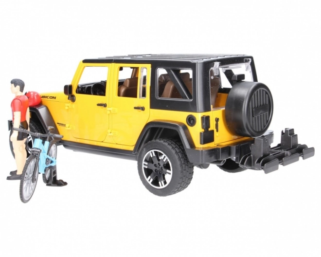 Bruder Jeep Wrangler Rubicon met fietser en fiets