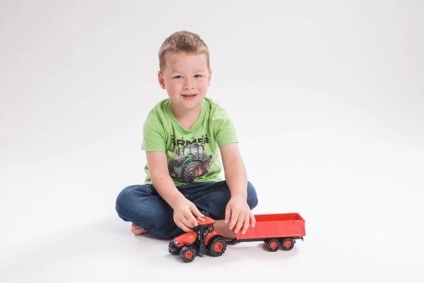 Rode Zetor tractor met aanhanger met geluidseffecten en lichteffecten - 36 cm