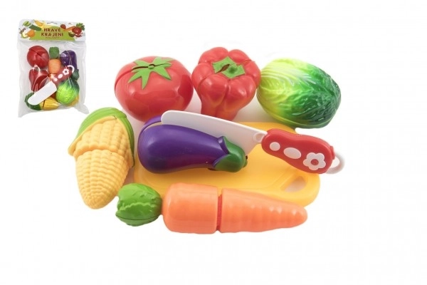 Snijgroente plastic met plank 13,5x8cm met mes in zak 18x26x5cm