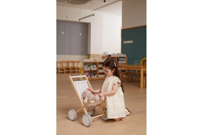Houten poppenwagen