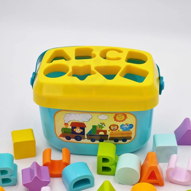 Woopie kindersorteerder en koffertje met het leren van het alfabet en vormen