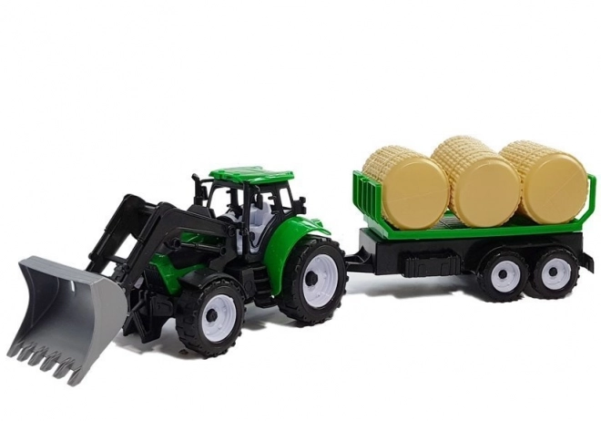 Tractor met aanhangwagen voor hooipakken Citerne