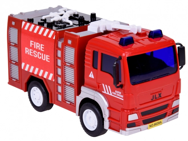 Grote brandweerwagen met geluid en kinderhelm