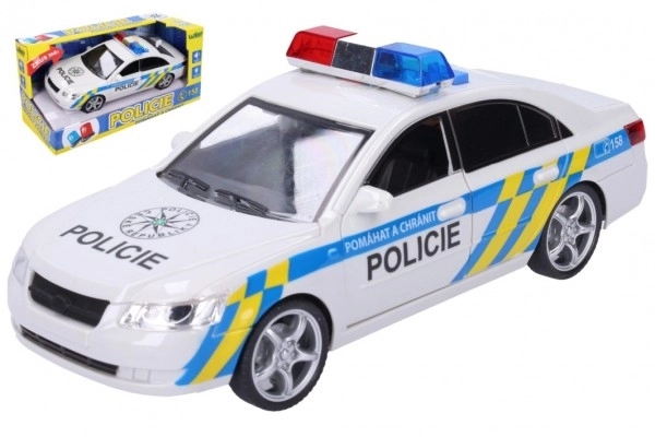 Plastic politieauto 24 cm op batterijen met geluid en licht in doos 28x14,5x12 cm