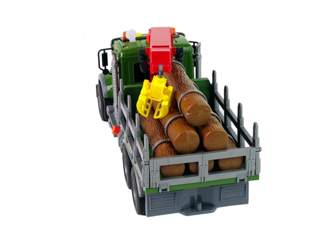 Speelvoertuig met kraan voor houttransport