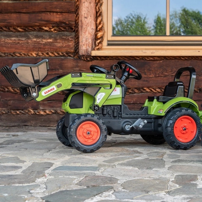 Trappertractor Claas Arion 410 met groene aanhanger