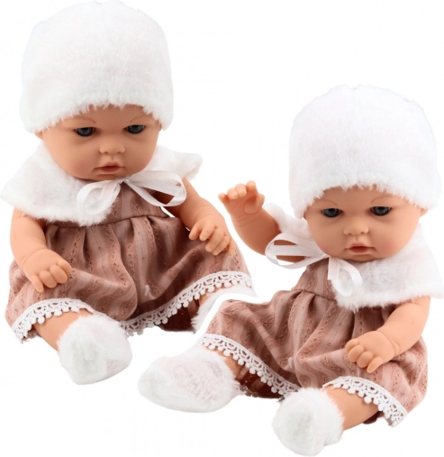 Babypop in beige jurkje met muts en kraag