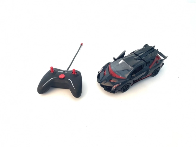 Sportieve RC auto rood-zwart op schaal 1:18