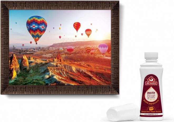 ART PUZZLE Puzzel met lijst en lijm 3-in-1 1000 stukjes – Luchtballonnen boven Cappadocië