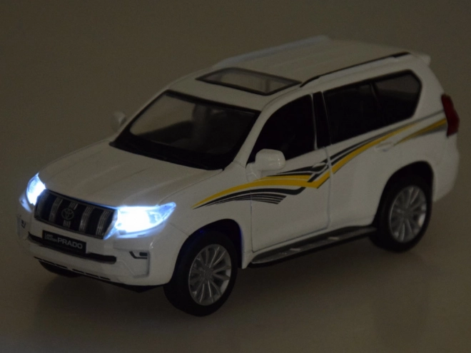 Metalen model Toyota Land Cruiser Prado met effecten