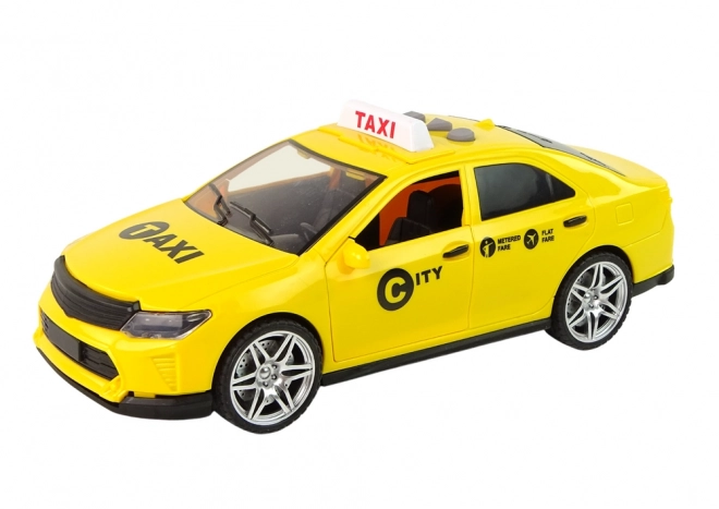 Taxi-auto 1:14 met licht en geluid – geel