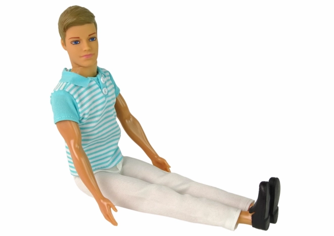 Kinderpop jongen blond haar – turquoise shirt