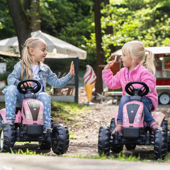 Tractor trapauto County Star met roze aanhangwagen
