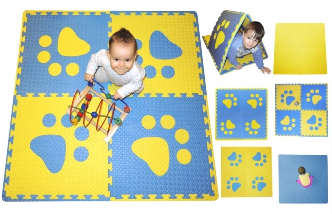 Schuimrubberen kinderkleed met blauwe en gele pootafdrukken