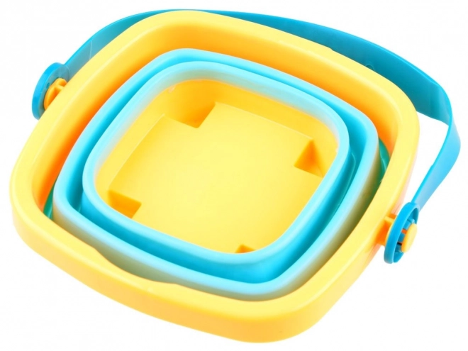 Set speelgoed voor zand met emmer en vormpjes