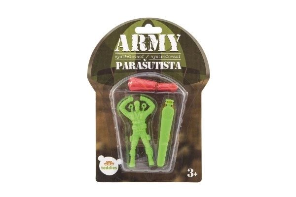 Parachutist figuur met parachute vliegend 9cm 2 kleuren op kaart