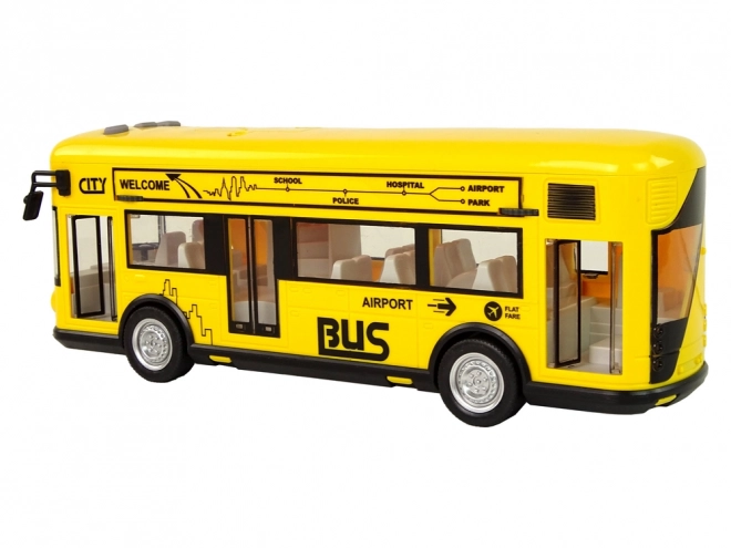 Gele stadsbus met frictie-aandrijving 1:18