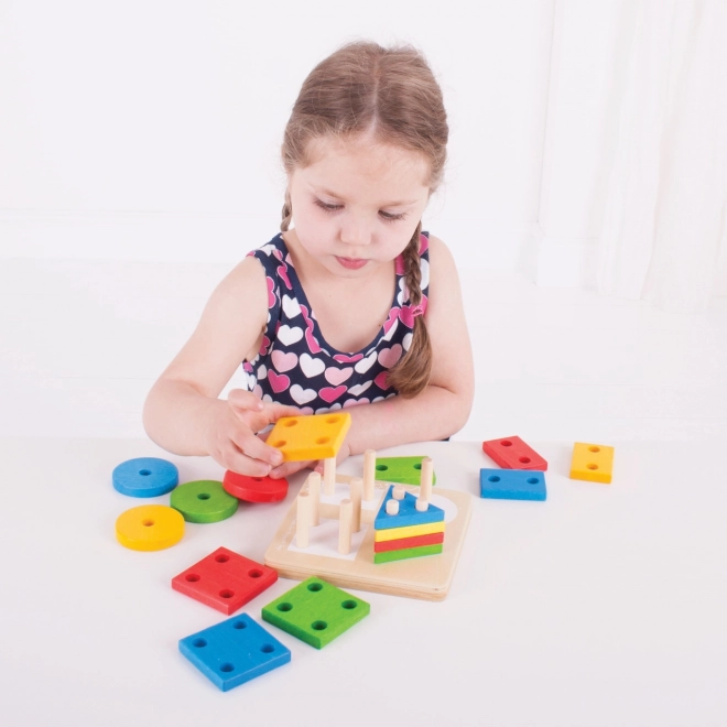 Stapelen van kleurrijke vormen Bigjigs Baby