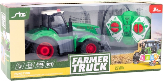 Groene op afstand bestuurbare tractor 1:24