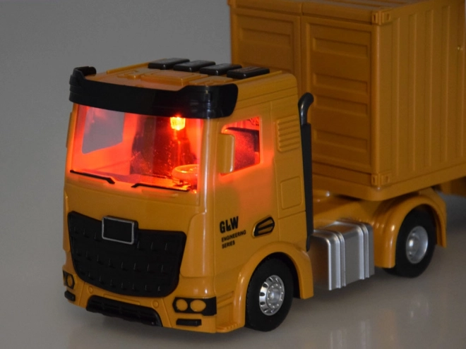 Interactieve set vrachtwagen met uitklapbare oplegger, kraan en heftruck
