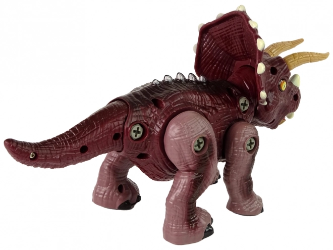 Schroevendraaier dinosaurus met boormachine Plastic