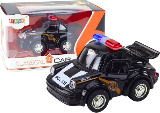 Klassieke zwarte politiewagen 1:38 met licht en geluid