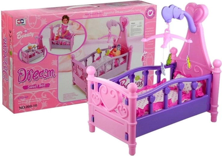 Grote kinderpoppenbed met mobiel en beddengoed
