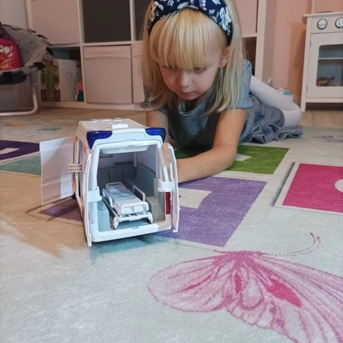 Kinderambulance met brancard en lichtsignalen
