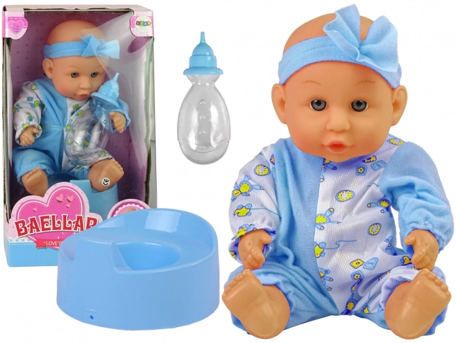 Poppenbaby op potje met blauwe strik