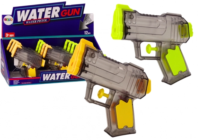 Kleine doorzichtige waterpistool geel oranje