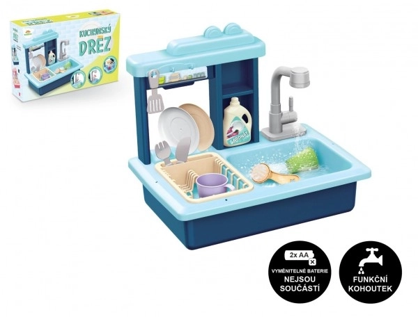 Blauwe kinderafwasbak met batterijgevoede kraan
