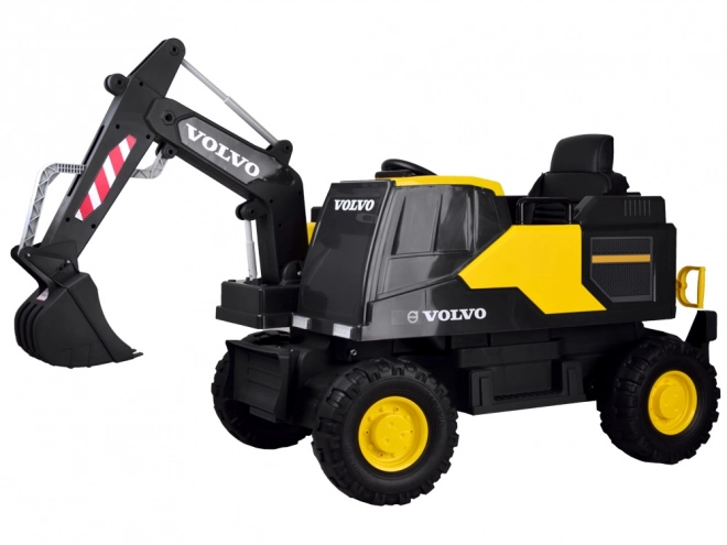 Kinderaccu-graver Volvo met beweegbare schep – Geel