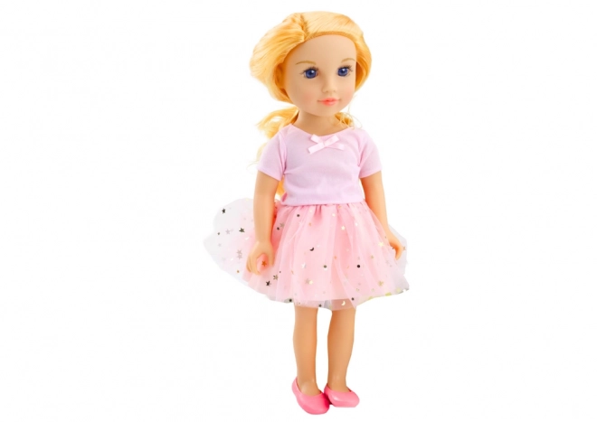 Pop in roze jurk met tule rok en blond haar