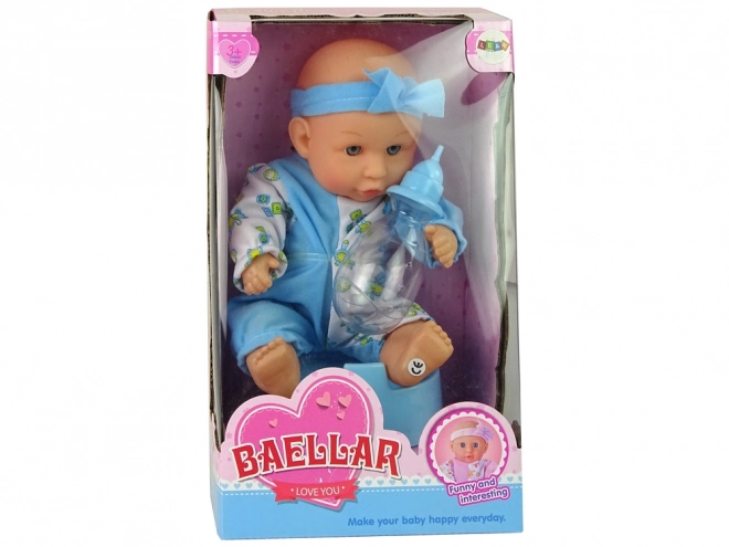 Poppenbaby op potje met blauwe strik