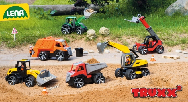 Auto Truxx 2 brandweer spuitende water plastic 29cm met figuurtje